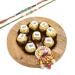Ghasitaram Gifts Rakhi Gifts for Brothers Cane Wooden Thali with Laddoos and Roli Chawal Container Thali with Laddoos and Container