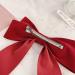 Sukokola 1ZSM Bow Hair Clip in Red - Stylish Acrylic Hair Accessory for All Occasions | International Shipping Available - Buy Online on GoSupps.com