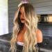 Buy Women's Long Blonde Curly Wig - Brazilian Synthetic Wavy Hair for Cosplay & Parties - Buy Online on GoSupps.com