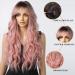Esmee Long Wavy Pale Pink Wig with Bangs - Curly Synthetic Hair for Women, Heat Resistant Fiber - Perfect for Daily Wear, Parties, and Cosplay - Buy Online on GoSupps.com