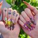 24Pcs Long Press on Nails Pointed Stiletto Fake Nails Colorful Sun Moon God Cloud Design Full Cover Glossy Acrylic Nails Almond Shape False Nails Reusable Artificial Glue on Nails for Women Manicure Sun Moon Nails-1