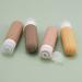 Essential Sphere Silicone Travel Bottles Set - 4x90ml BPA-Free Refillable with Transparent Bag - Perfect for Hand Luggage - Brown Tones - Buy Online on GoSupps.com