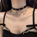 Oralgos Black Choker Necklace | Gothic Detail & Tassel | Stylish Halloween Party Accessory for Girls | Alloy & Metal Fashion - Buy Online on GoSupps.com