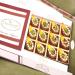 Ghasitaram Gifts Diwali Gifts Sweets - Designer Mithai Diyas in White Box