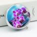 Beautiful Orchid Print Round Pill Box - 3 Compartment Portable Medicine Organizer | Decorative Metal Pocket Pill Case - Buy Online on GoSupps.com