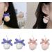 Feyley Exaggerated Bowknot Earrings | Chic Plush Ear Jewelry for New Year's & Birthday Gifts - Buy Online on GoSupps.com