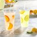 Comfy Package 24 oz. Crystal Clear Plastic Cups with Flat Lids - 100 Sets - Buy Online on GoSupps.com