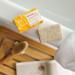 Kind Natured The Awakening Cleansing Scrub Bar Natural Orange and Grapefruit Vegan Bar Exfoliating Soap 100g - Buy Online on GoSupps.com