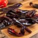 1lb Guajillo Stemless Chile - Whole Dried Red Chile Peppers for Mexican Salsa | Versatile Ingredients by 1400s Spices - Buy Online on GoSupps.com