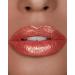 HOURGLASS Unreal High Shine Volumizing Lip Gloss in Solar - Shop Now! - Buy Online on GoSupps.com