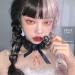 Uwowo Long Curly Black Taro Powder Lolita Wig with Bangs - Heat Resistant Synthetic Hair for Cosplay & Anime Parties - Buy Online on GoSupps.com