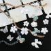 WOKOTO 2 Box 3D Nail Charms: Rhinestones, Flowers, Butterflies, Pearls, Bears & Bows Set - Buy Online on GoSupps.com