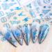 JMEOWIO Christmas Nail Art Stickers 9 Sheets Self Adhesive Nail Decals Snowflake Reindeer Pattern DIY Design Nail Decoration for Women Girls - Blue - Buy Online on GoSupps.com