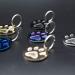 Custom Engraved Round Paw Print Cat Tags in Stainless Steel - Personalized ID with 4 Lines - Gold, Rose Gold, Blue, Black, Nebula Options - Buy Online on GoSupps.com