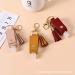 HSYHERE Multifunction Portable Empty Travel Bottle Keychain Hand Sanitizer Bottle Keychain PU Leather Tassel Key Chains Car Key Ring +Refillable Containers for Toiletry Shampoo Lotion Soap -Grey - Buy Online on GoSupps.com