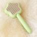 Self-Cleaning Cat Brush with Unlocking Button - Compact Fur Care Brush for Dogs Cats & Rabbits - Efficient Hair Removal in Green - Buy Online on GoSupps.com