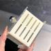 Stylish Milk White Bathroom Storage Box | Self-Adhesive Wall Bracket for Toothpaste Toothbrush & Cosmetic Brushes - Perfect for Organized Spaces - Buy Online on GoSupps.com