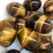 Specimen Dark Yellow Tiger Eye Quartz Crystal Egg 5cm - Buy Online on GoSupps.com