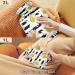 NAANLE Striped Daisies Hot Water Bottle with Lid - 1L for Menstrual Cramps Relief & Heat Therapy | Transparent Design - Buy Online on GoSupps.com