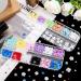 Noverlife 24 Grids Colorful Flower Nail Charms Set for DIY Nail Art - Rhinestones, Gems, Studs, Blossom Decals & Metal Balls - Ideal for Crafts, Phone Cases & Makeup - Multi-Colored - Buy Online on GoSupps.com