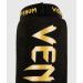 Venum Art Uni Kontact Shin and Foot Guard XL - Black/Gold | International Shipping Available - Buy Online on GoSupps.com