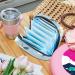 MUOOUM Sanitary Napkin Storage Bag - Daisy on Blue Background | Menstrual Cup Pouch for Women | Portable Menstrual Pad Storage Bag | Feminine Menstruation First Period Bag | Multi-colored - Buy Online on GoSupps.com