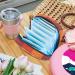 Portable Women's Menstrual Storage Bags | Cute Checkered Orange Bags for Pads Tampons & Menstrual Cups | Ideal for Teens - Buy Online on GoSupps.com