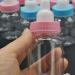 24 Lucas Shops Bottles with Removable Pink Tops - Ideal for Baby Showers, Parties, and Favors | 3.5 x 1.60 Inch - Buy Online on GoSupps.com