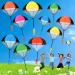 NcKihrkk 12 pieces parachutist toy parachute toy children outdoor hand throw air toys for children shared children's birthday guest gifts