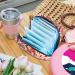 Storage Bags for Women's Bandages & Menstrual Products | Large Floral Zip Pocket for Tampons & Panty Liners | Multi-Colored Cylinder Inserts - Buy Online on GoSupps.com