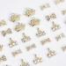 40Pcs 3D Alloy Nail Rhinestones Diamond Crown and Bowknot Charms - Luxury Gold Nail Jewelry Decorations for Women and Girls - DIY Nail Design - Buy Online on GoSupps.com