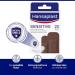 Hansaplast Sensitive Skin Tone Plaster Dark - Hypoallergenic & Skin-Friendly Wound Care (20 Strips) | Painless Bacteria Shield Safe Adhesive - Buy Online on GoSupps.com