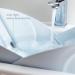 Soft Sink Baby Bath by Frida Baby - Easy-to-Clean Bathtub with Head-Supporting Cushion - Buy Online on GoSupps.com