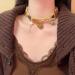 Oralgos Fashionable Brown Cat Bracelet | Chic Jewelry for Women | Stylish Bangle & Petite Collarbone Chain - Buy Online on GoSupps.com