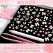 BELICEY 1000PCS 3D Nail Charms - Cute Butterfly Bow Star Heart & Moon Designs for Nail Art DIY - Includes Picker Pencil & Tweezer - Pink & White Flower Collection - Buy Online on GoSupps.com