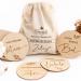 Prinzental 30 baby milestone cards for TWINS on elegant wooden discs | Original gift for the birth of twins