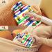 NAANLE Colorful Striped Hot Water Bottle with Cover - 1L for Menstrual Cramps Pain Relief & Heat Therapy - Buy Online on GoSupps.com