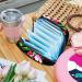 Womens Napkin Storage Bag | Tropical Black Flowers | Portable Menstrual Cup & Bandages | Ideal for First Periods | International Shipping - Buy Online on GoSupps.com
