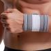 Neotech Care Wrist Band - Adjustable Compression Strap - Elastic & Breathable - Grey - Size M - 1 Pair - Buy Online on GoSupps.com