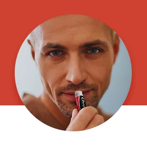 Chapstick Lip Care Skin Protectant Classic Strawberry 3 Sticks 0.15 oz (4 g) Each - man using ChapStick Classic Strawberry