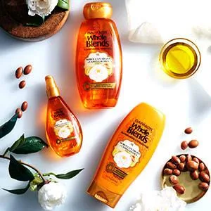 Garnier Whole Blends Illuminating Conditioner Moroccan Argan & Camellia Oils Extracts 12.5 fl oz (370 ml) - product information 2