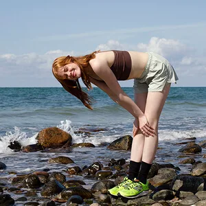 AllMatters Menstrual Cup (Formerly OrganiCup) Size A for Those Who Haven t Given Birth Vaginally. Award Winning Period Cup - Model on beach resting after exercise