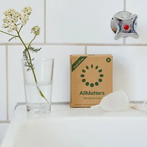 AllMatters Menstrual Cup (Formerly OrganiCup) Size Mini for Teens or Those Who Need a Smaller Size. Award Winning Period Cup - AllMatters menstrual cup product display on bathroom sink