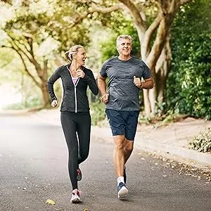 Nature Made Vitamin D3 50 mcg 250 Softgels - middle aged couple happily running in park