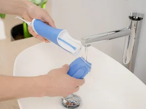 Panasonic Oral Irrigator EW1211 (mobile cordless and rechargeable electric) blue/white - product information 7