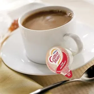 Coffee Mate Creamer 4 Flavor includes Original French Vanilla Hazelnut Italian Sweet Crème - 100 Count - lifestyle 2