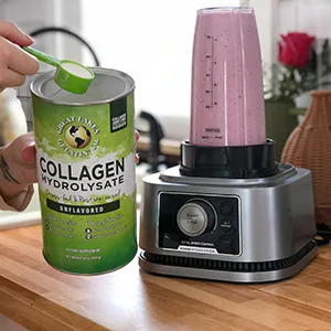 Great Lakes Gelatin Collagen Hydrolysate Unflavored Beef Protein Kosher 16 Oz Can - Unflavored Collagen Hydrolysate Powder scooped in a measuring spoon