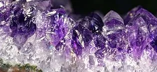 Gemstone set "Colludo" | Natural tumbled stones in various sizes | Practical in a colorful fabric bag XS (0.5-1.3 cm) - amethyst von der Seite