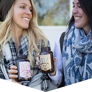Epic Provisions EPIC Duck Fat Keto Friendly, Whole30, oz Jar EPIC Duck Fat, Keto Consumer Friendly, Whole30, 11 Ounce - Two women smiling while each enjoy an EPIC gluten free bone broth beverage