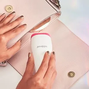 JuvaLips | Original White Lip Plumping Device & Plumping Serum | Made in the USA - JuvaLips Lip Plumping device being placed into a small purse
